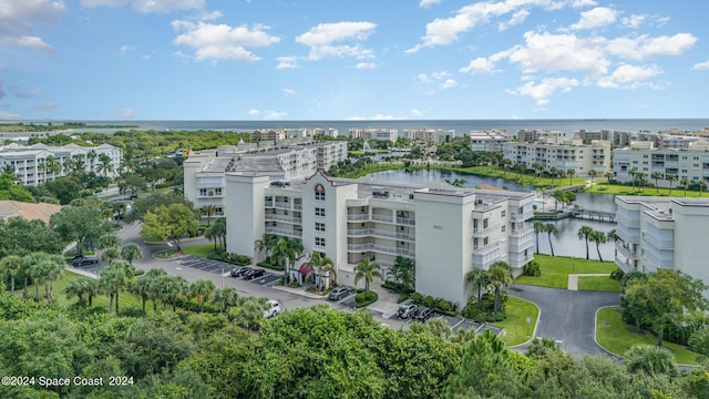 8931 Lake Dr Unit 401, Cape Canaveral, FL 32920 - bird's eye view with a water view