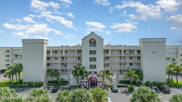 8931 Lake Dr Unit 401, Cape Canaveral, FL 32920 - view of property with uncovered parking