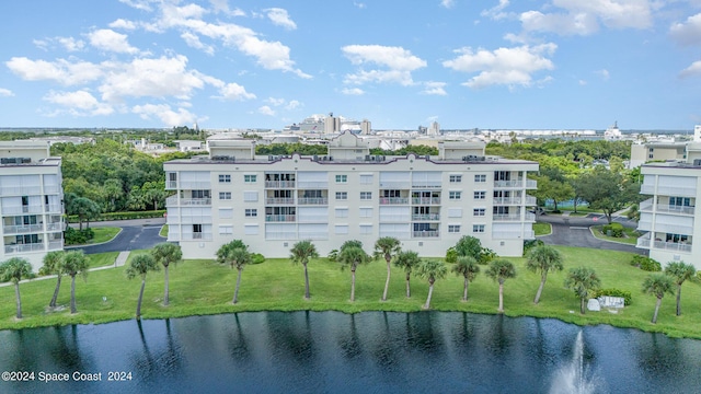 8931 Lake Dr Unit 401, Cape Canaveral, FL 32920 - view of building exterior featuring a water view