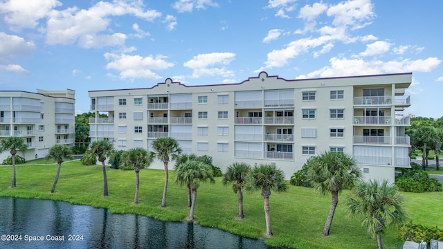 8931 Lake Dr Unit 401, Cape Canaveral, FL 32920 - view of property featuring a water view