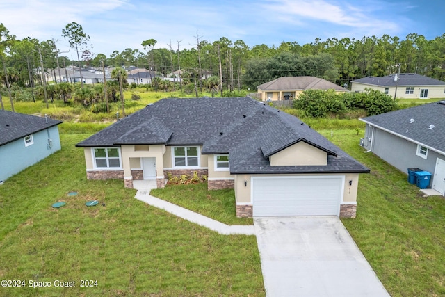 view of front facade featuring concrete driveway, a front lawn, and stone siding