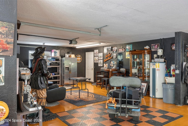 living room featuring gas water heater and a textured ceiling