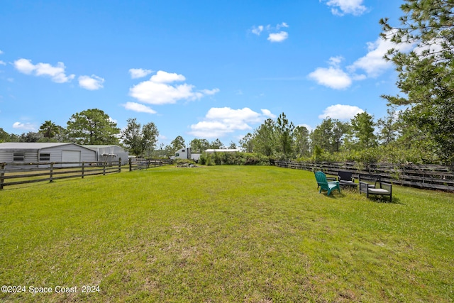 view of yard featuring a rural view