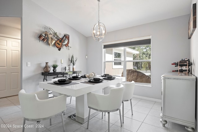 dining space featuring a chandelier and light tile patterned floors