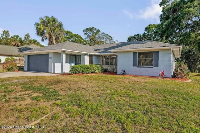 single story home with a front lawn and a garage