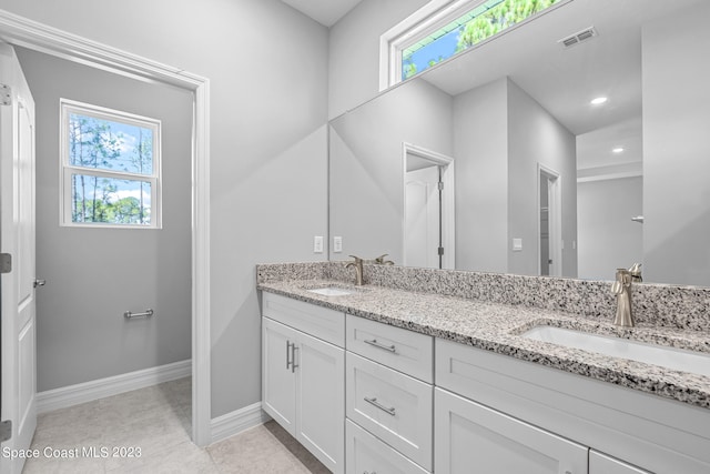 bathroom featuring vanity and tile patterned floors