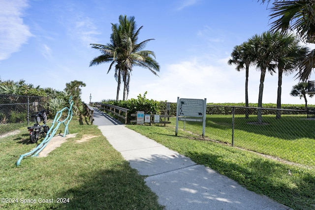 surrounding community featuring a yard