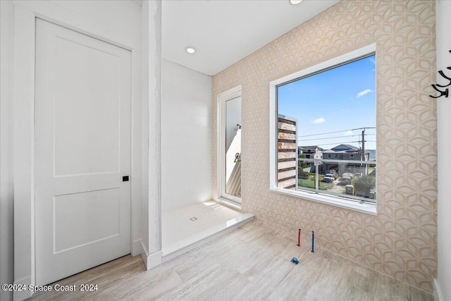 bathroom with wood-type flooring