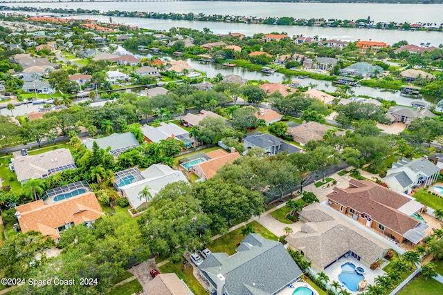 drone / aerial view featuring a water view