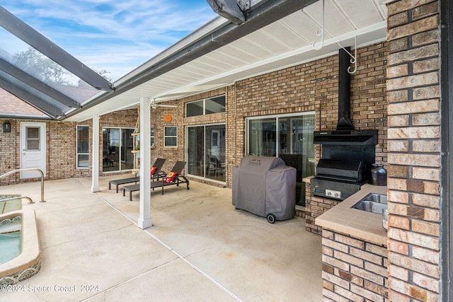 view of patio featuring area for grilling