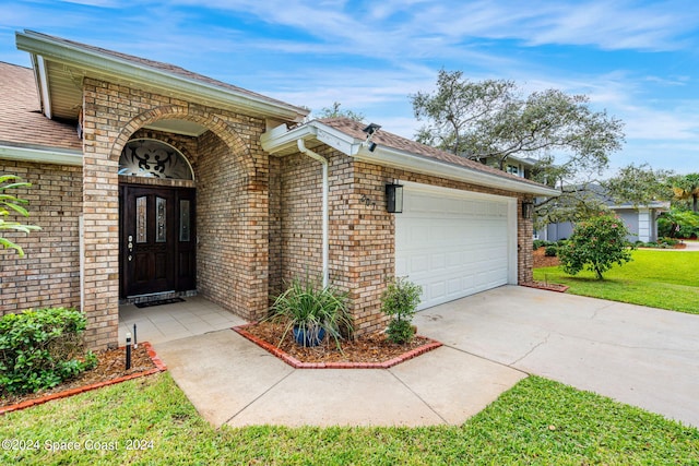 property entrance with a garage