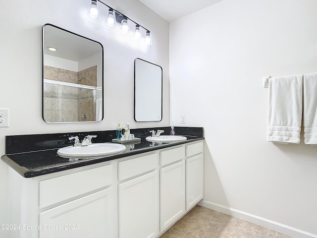 bathroom with vanity and an enclosed shower