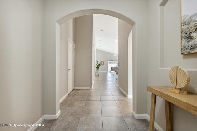 corridor with light tile patterned floors