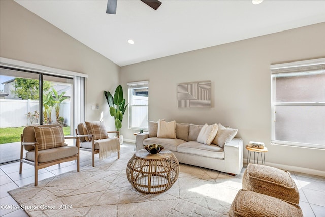 living room featuring light tile patterned floors, ceiling fan, and lofted ceiling