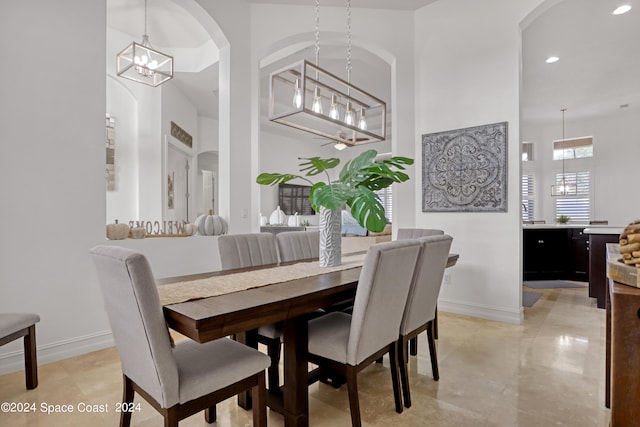 dining area featuring a chandelier