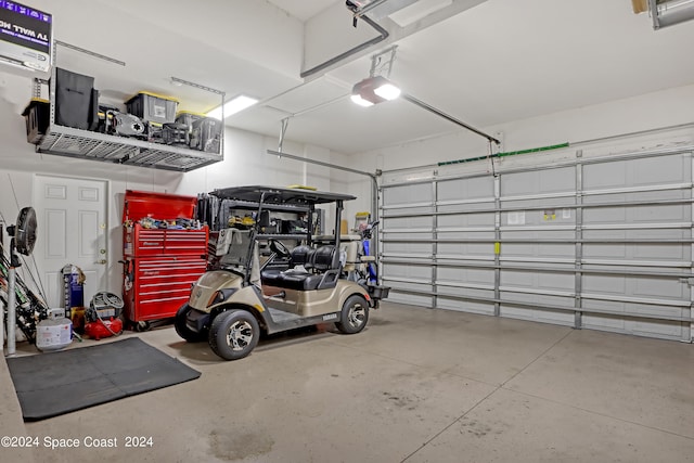 garage featuring a garage door opener