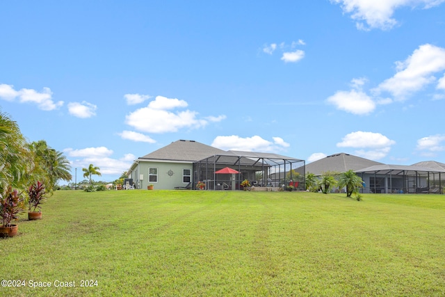 view of yard with a lanai