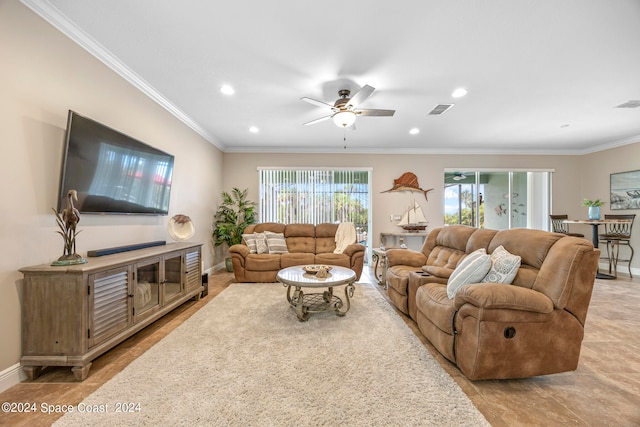 living room featuring ornamental molding and ceiling fan