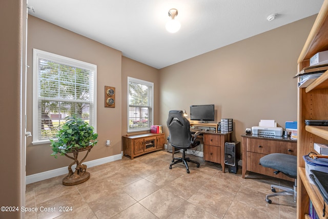 office space featuring light tile patterned flooring