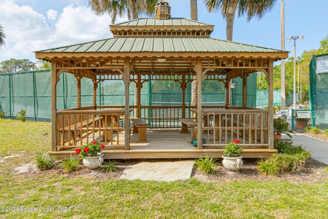 wooden terrace with a gazebo