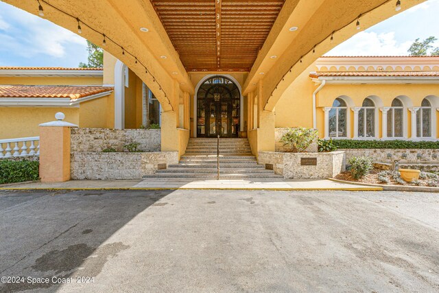 entrance to property featuring french doors