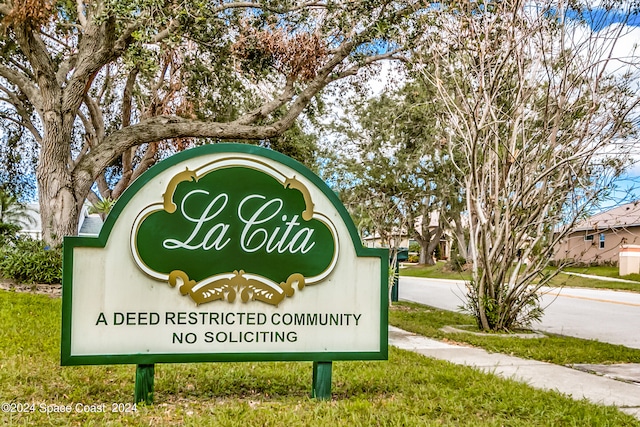 view of community sign