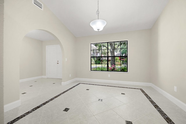 view of tiled spare room