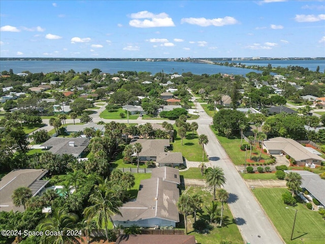 bird's eye view with a water view