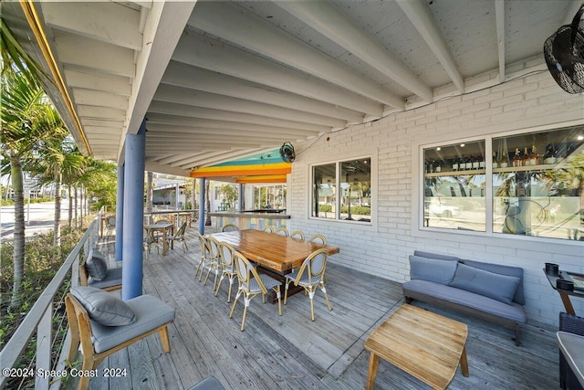 wooden deck with an outdoor hangout area