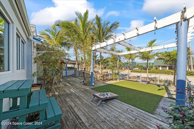 wooden deck with a pergola