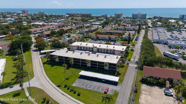 bird's eye view with a water view