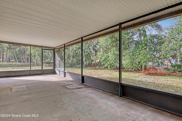 unfurnished sunroom with plenty of natural light