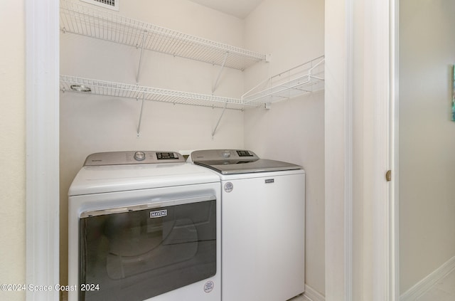 laundry area featuring washer and clothes dryer