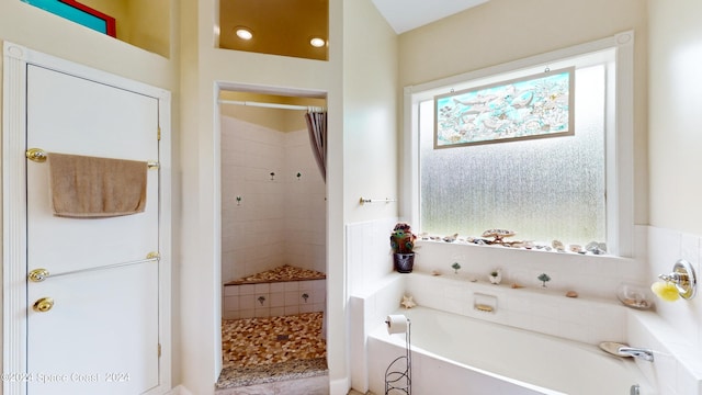 bathroom with independent shower and bath