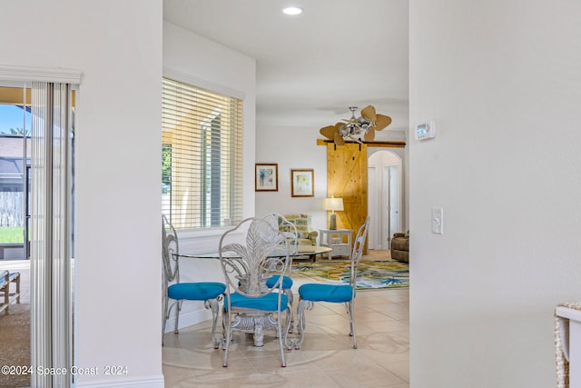 dining space with light tile patterned floors