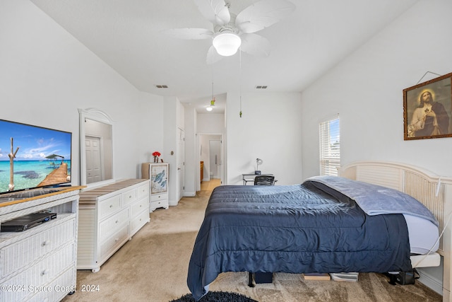 bedroom with light carpet and ceiling fan