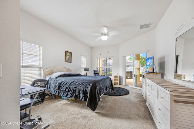 bedroom with multiple windows, light colored carpet, and ceiling fan