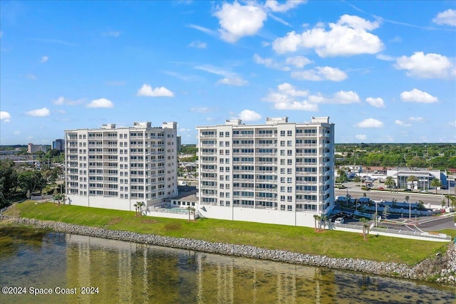 view of property with a water view