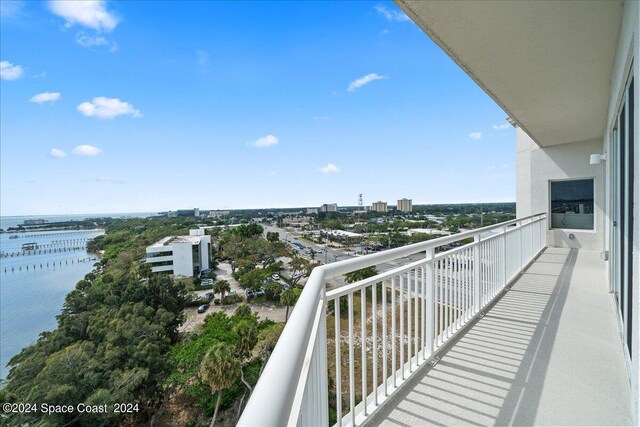 balcony featuring a water view