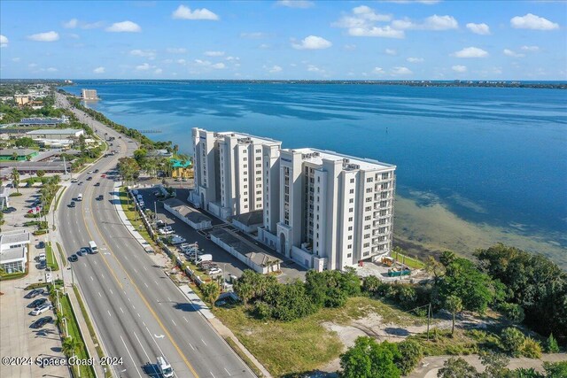 drone / aerial view featuring a water view