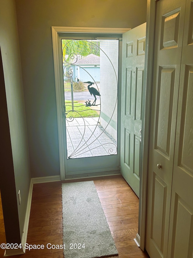 doorway featuring hardwood / wood-style flooring