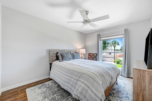 bedroom featuring ceiling fan and dark hardwood / wood-style flooring