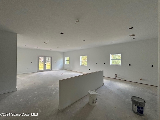 empty room featuring french doors