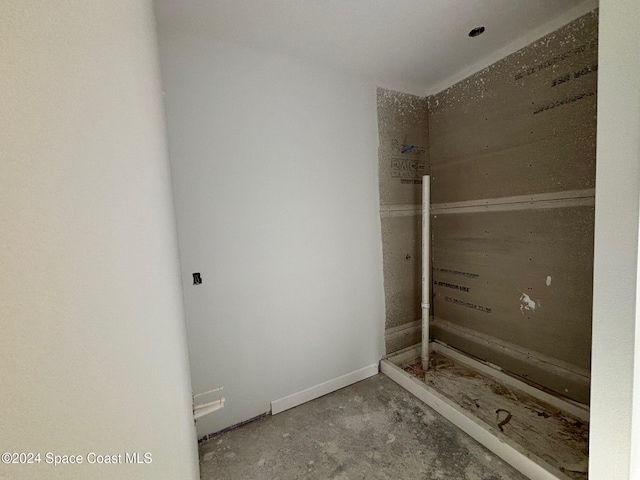 bathroom with concrete floors