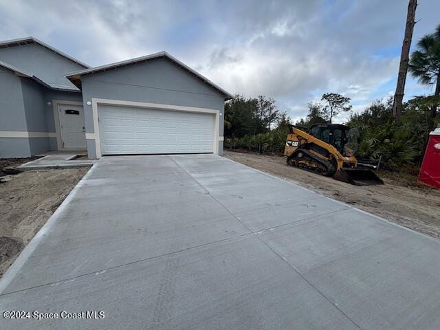 exterior space featuring a garage