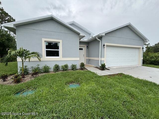 3250 San Jose Ave SE, Palm Bay, FL 32909 - view of front of home featuring a garage, concrete driveway, stucco siding, and a front lawn