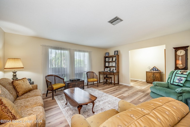 living room with light hardwood / wood-style floors