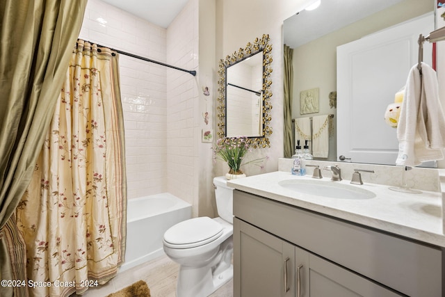 full bath with vanity, toilet, and shower / tub combo