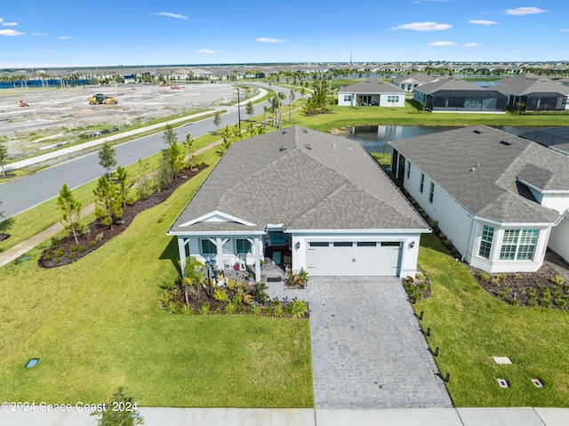 bird's eye view with a water view