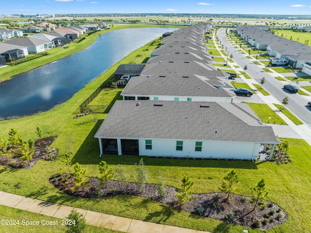 aerial view with a water view and a residential view